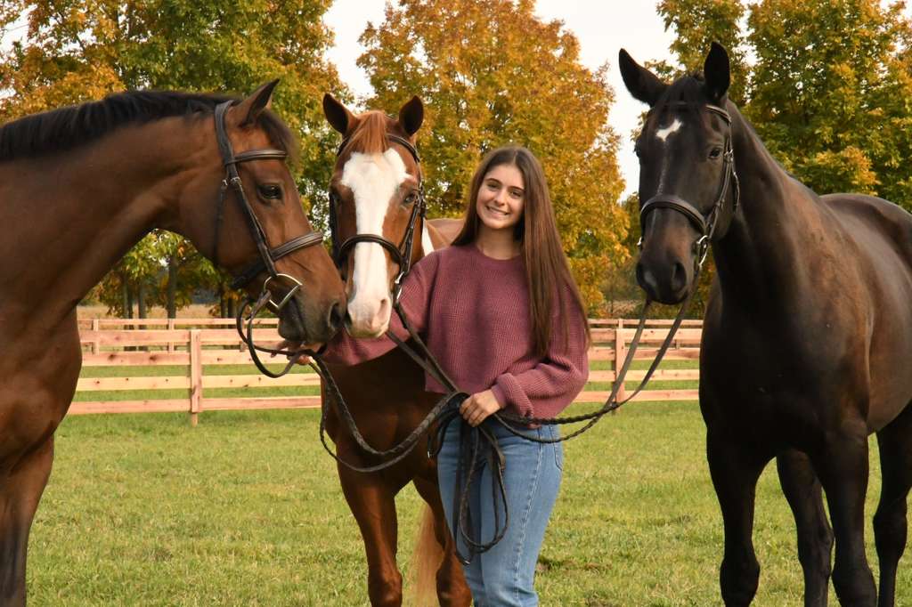 Chloe with three horses in autumn